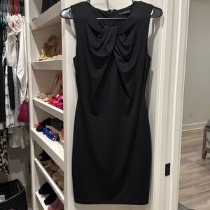 Black dress size medium with cut out details on the front